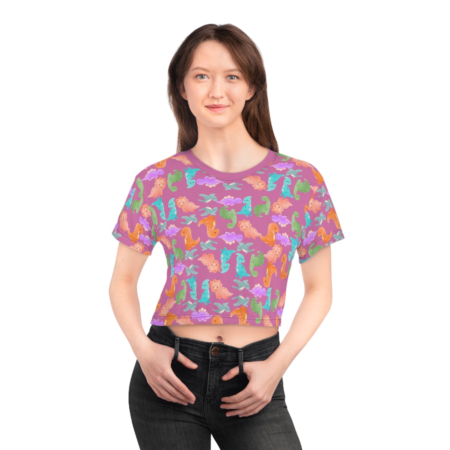 Whimsical Dinosaur Crop Tee for Kids Cheerful Summer Top Fun Gift for Dinosaur Lovers Playful TShirt for Birthdays Trendy Casual Wear Rainbow Dinos Light Pink