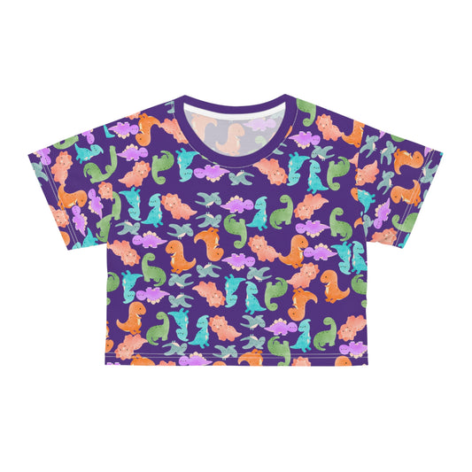 Whimsical Dinosaur Crop Tee for Kids Cheerful Summer Top Fun Gift for Dinosaur Lovers Playful TShirt for Birthdays Trendy Casual Wear Rainbow Dinos Purple
